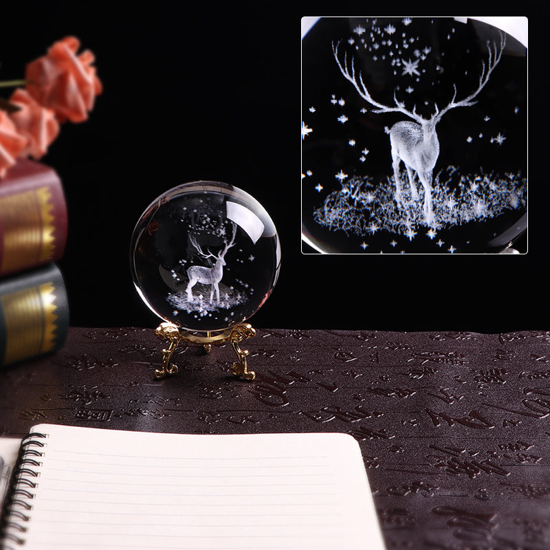 Crystal internally carved elk crystal ball