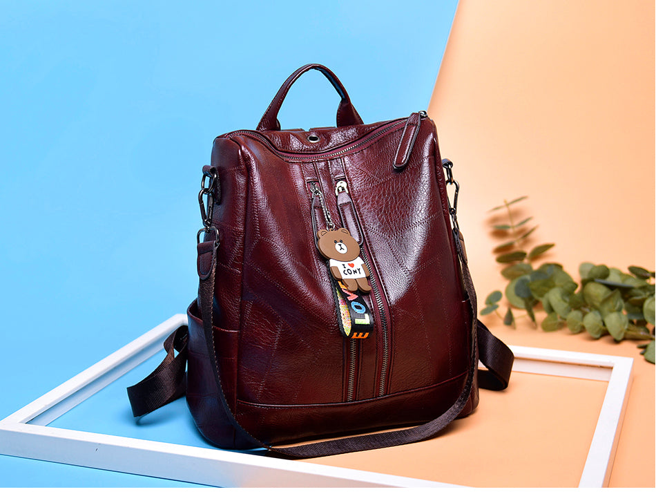 PU stitching leather waterproof backpack